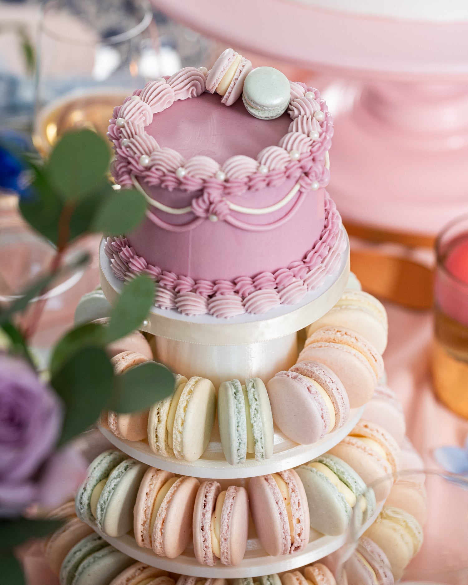 macaron tower with small mini cake custom retro piping for halifax sweet table