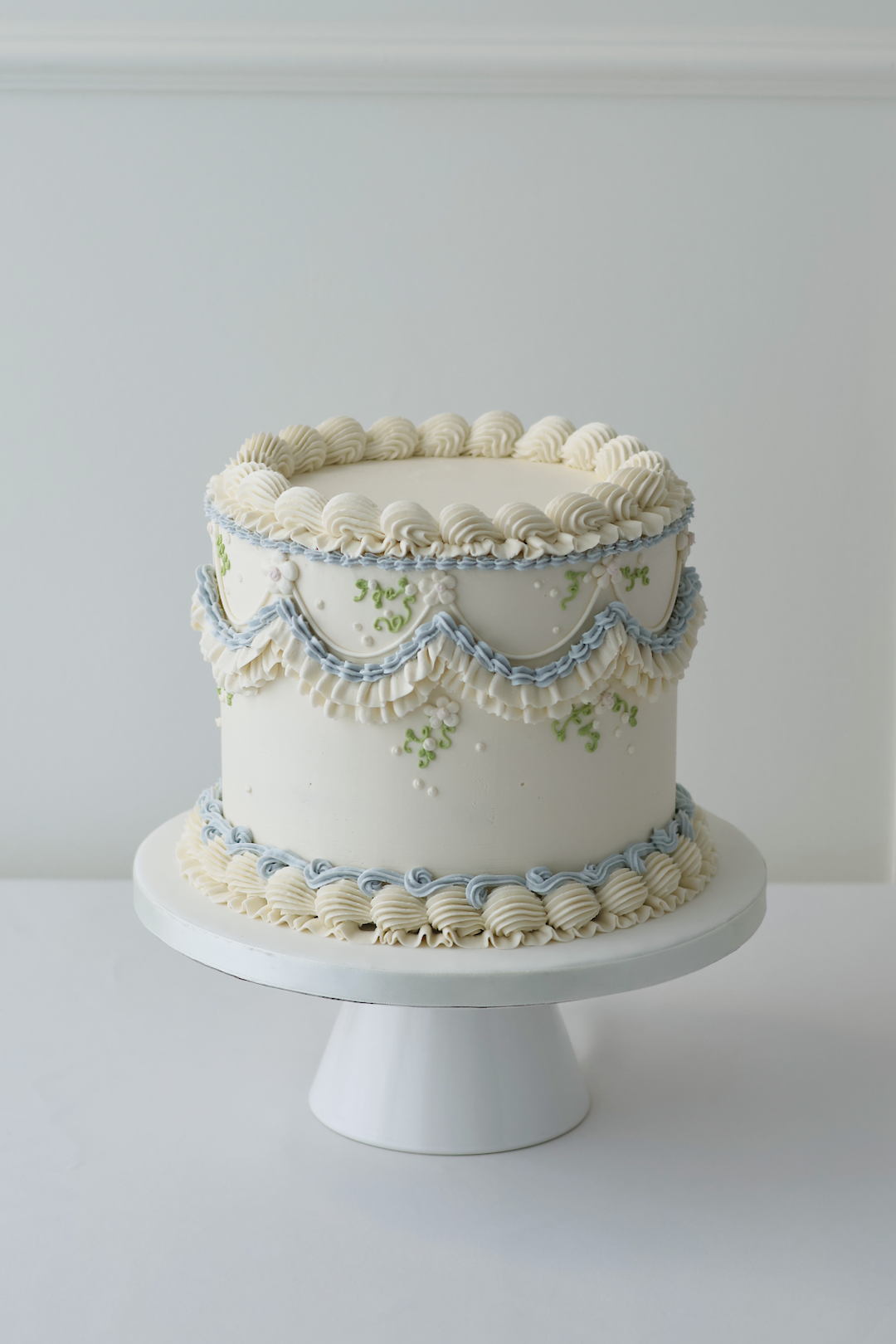 Blue and green vintage wedding cake