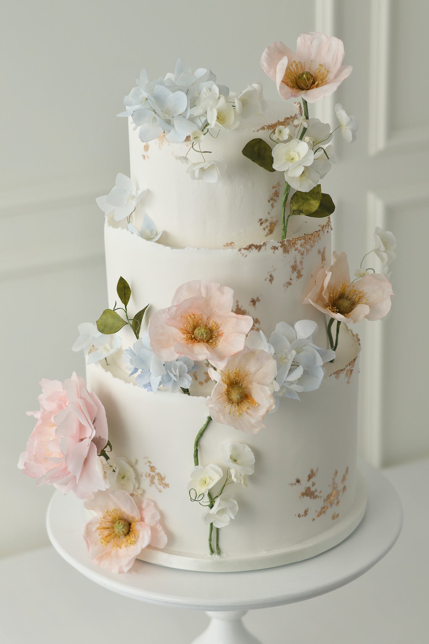 Floral and gold wedding cake