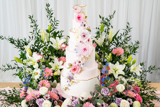 pink lavender and gold wedding cake with wafer paper flowers