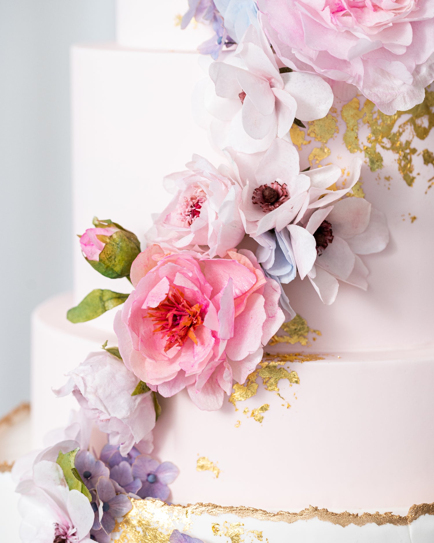 edible sugar wafer paper flowers on a wedding cake by sugar nursery