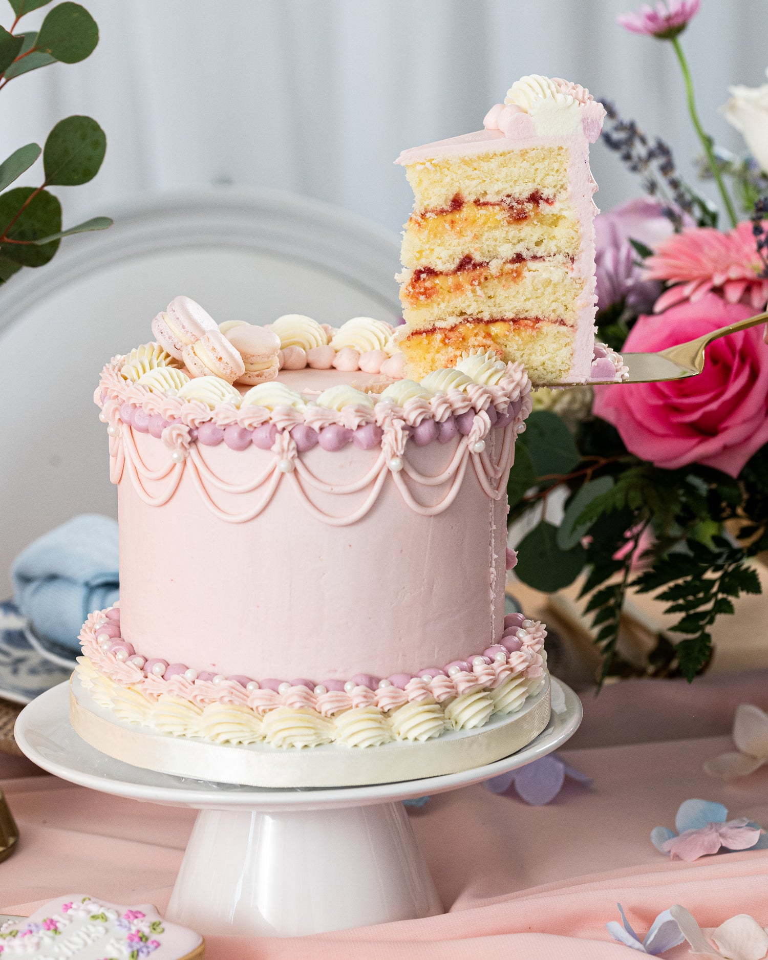 raspberry lemon cake with vanilla buttercream for custom dessert table